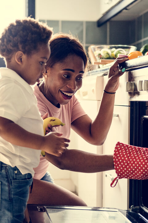 Mom and son baking